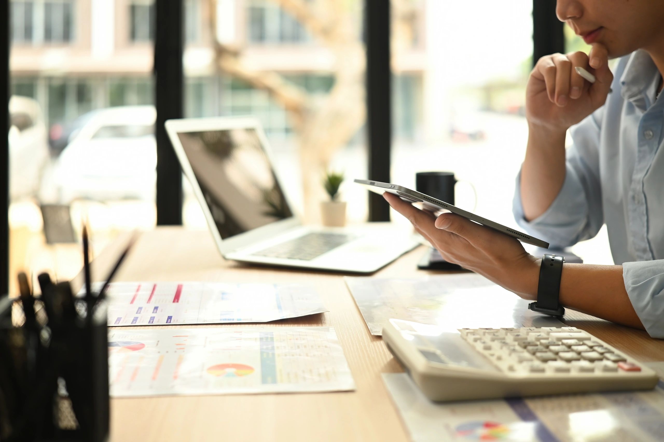 Professional analyzing business performance metrics